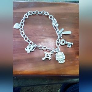 James avery bracelet with 5 charms